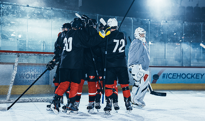 ice-hockey-rink-arena-forward-player-hit-puck-scored-goal-professional-hockey-team-celebrates-victory-embrace-each-other-emotional-moment